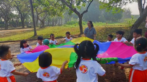 TK A 1 “Parachute games using ball. it called “don’t drop the ball (team play)”